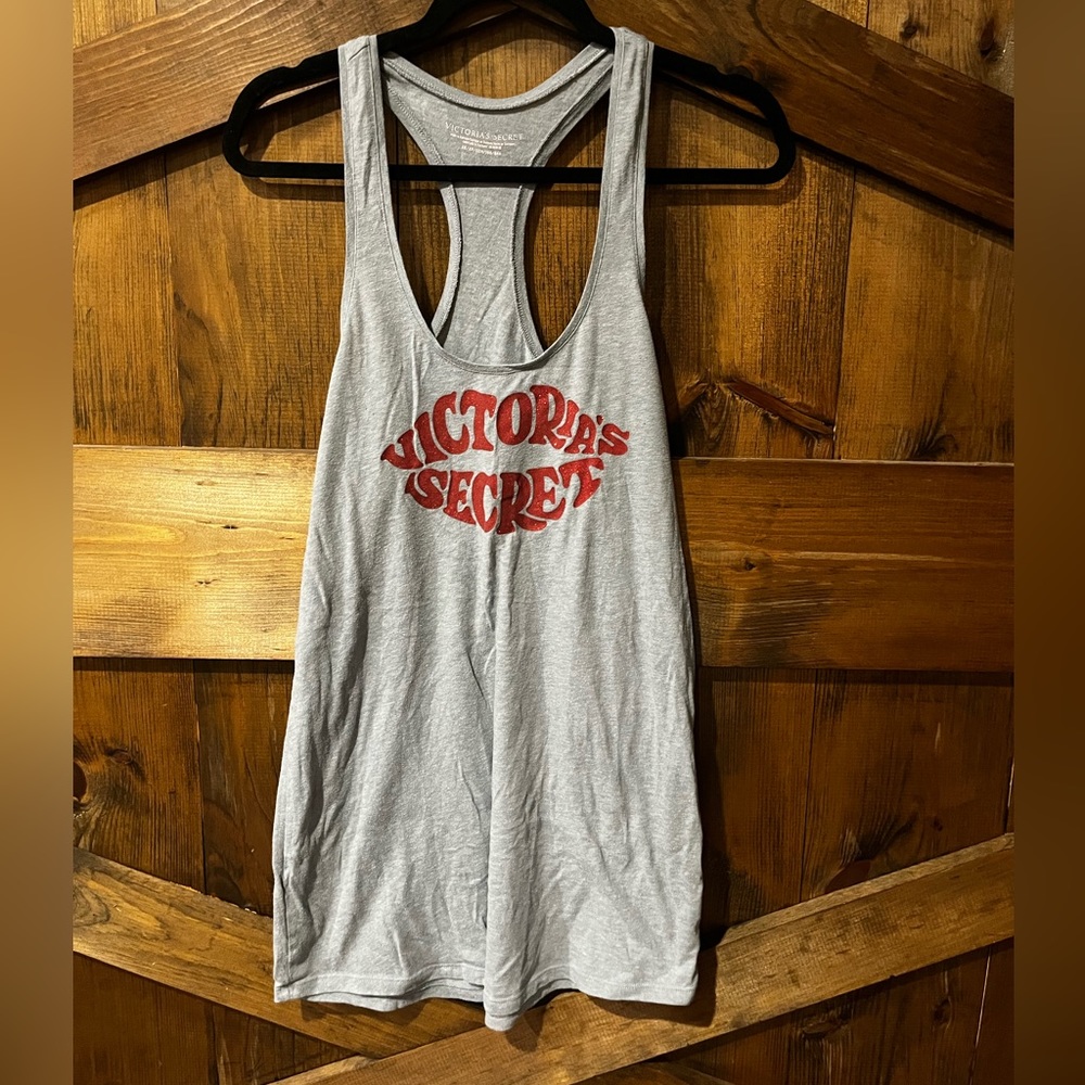 Victoria’s Secret grey tank. XS-loose fit. Could fit S & M as well.